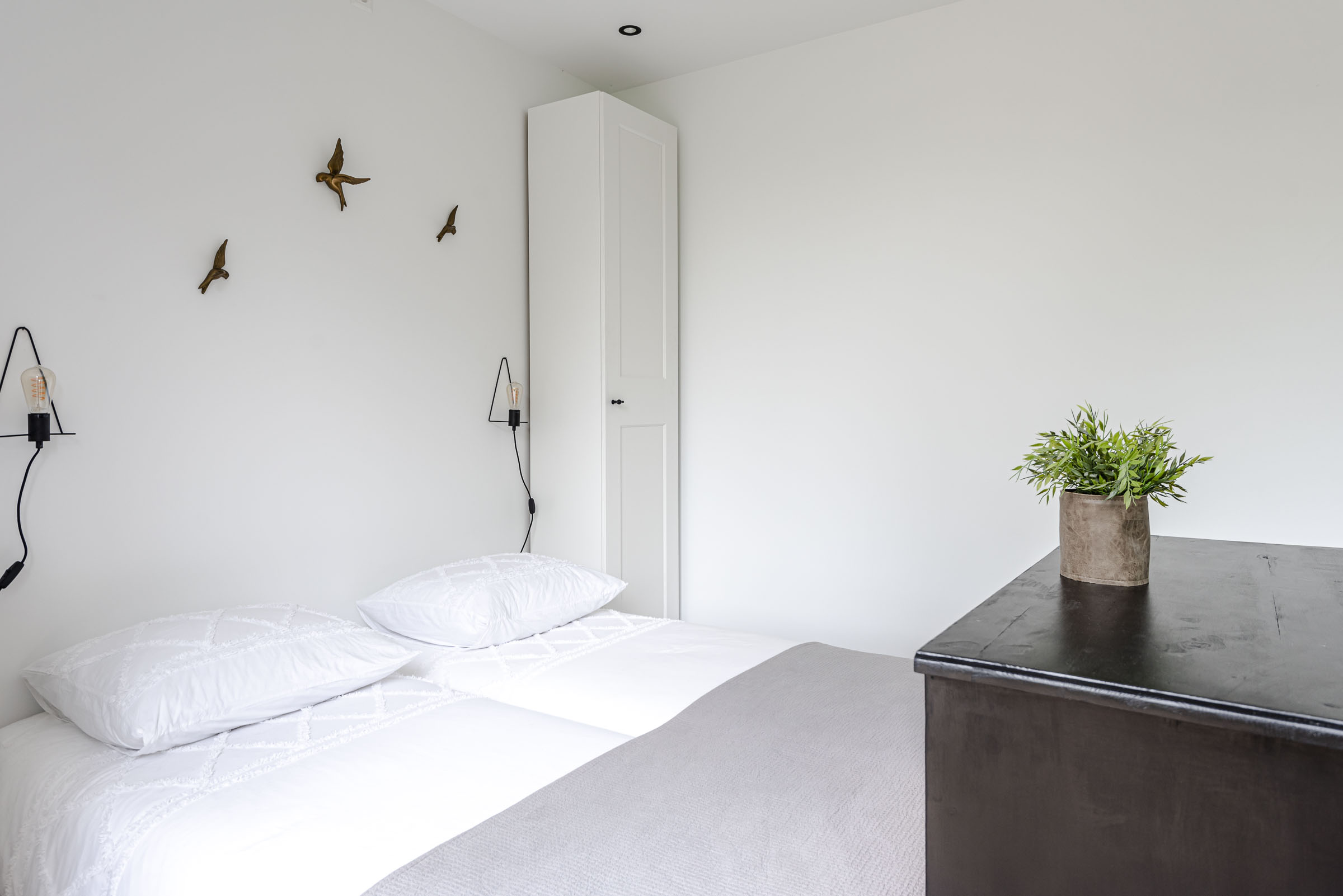 Slaapkamer in het vakantiehuisje in Bentveld met bed en rustige uitstraling